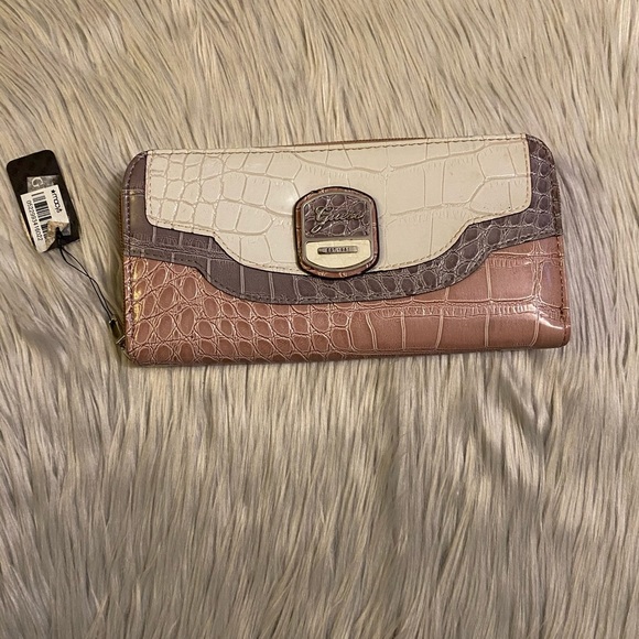 Guess Handbags - 🆕 Guess Off White, Purple & Pink  Reptile Pattern Wallet